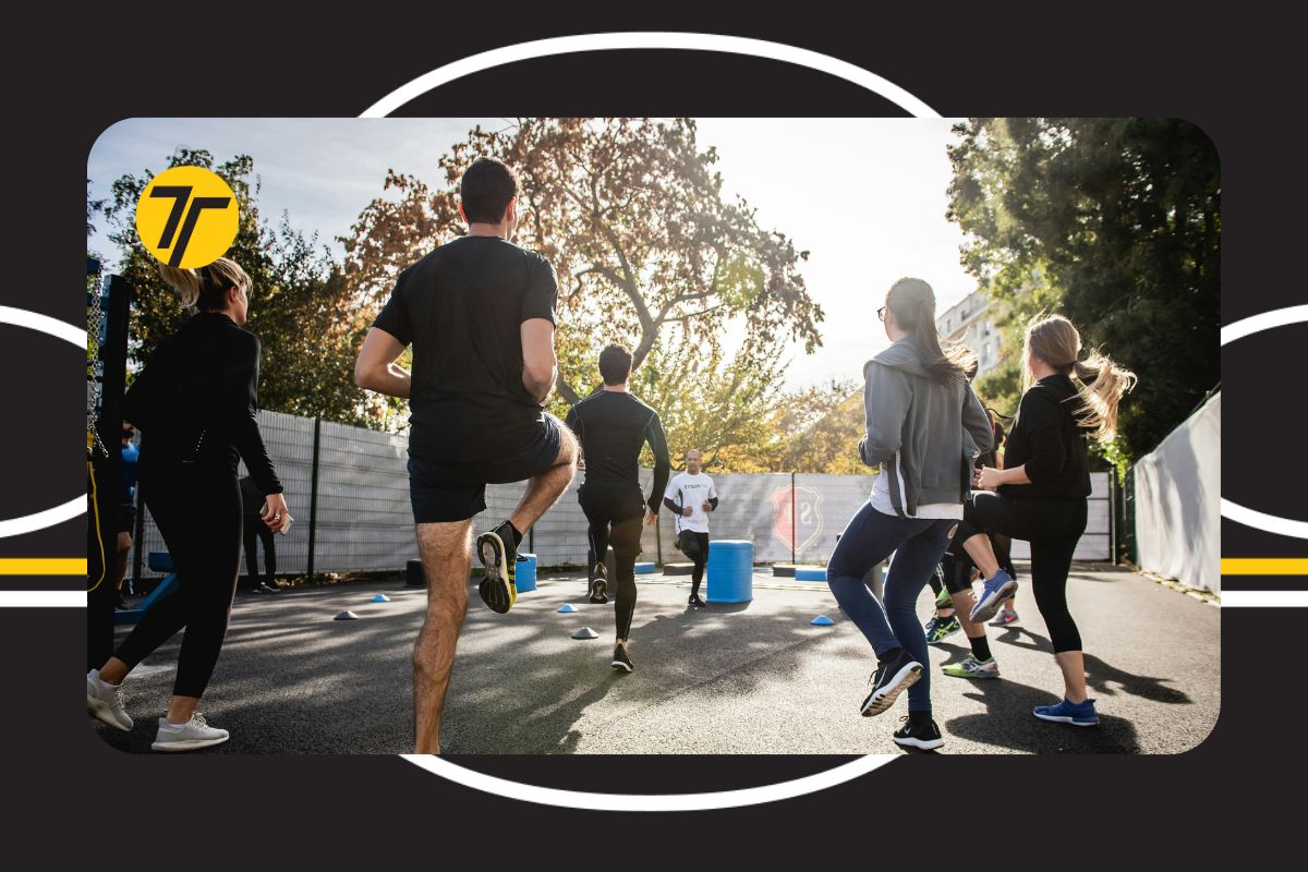 Colleagues warming up for a run outside
